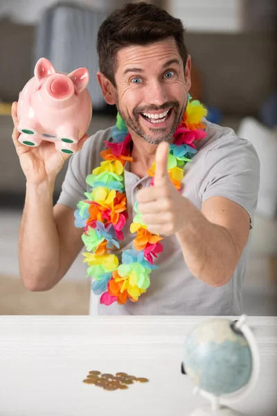 Man Holding Piggybank His Thumbs — Stock Photo, Image