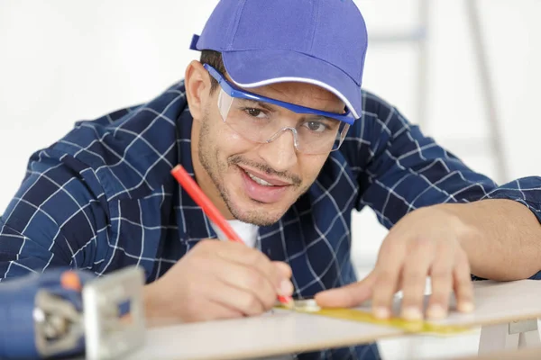 Male Contractor Measuring Materials Ruler — Stock Photo, Image