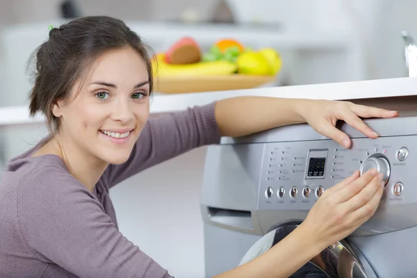 Portrait Woman Choosing Programme Washing Machine — Stock Photo, Image