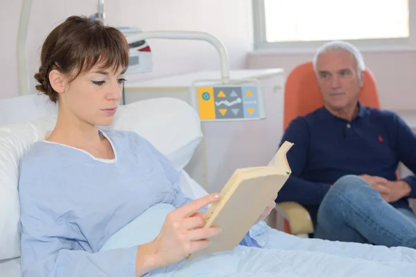 Female Patient Reading Man Chair Bed — Stock Photo, Image