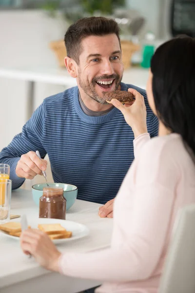 Woman Feeding Her Beloved Boyfriend Breakfast — Stock Photo, Image