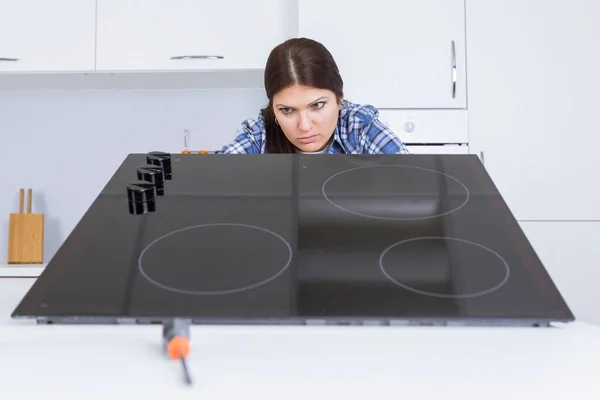 a woman during kitchen installation