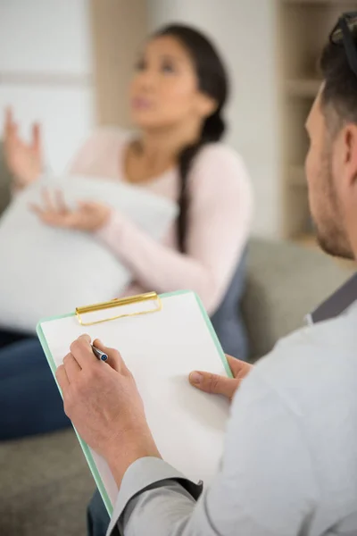 Therapist Making Notes While Listening His Patient — Stock Photo, Image