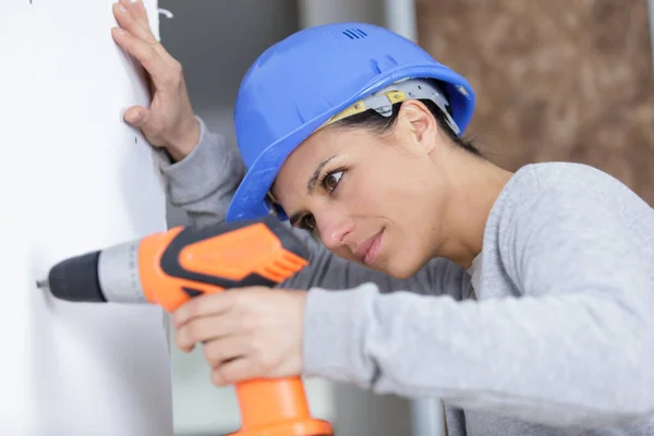 Woman Drilling Wall New House — Stock Photo, Image