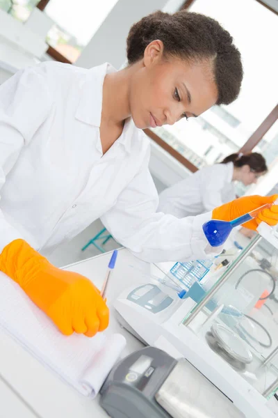 Serious Female Scientist Holding Blood Tube — Stock Photo, Image