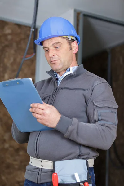 Close Worker Inspector Holding Clipboard — Stock Photo, Image