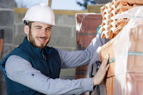 Roofer Builder Choosing Roofing Red Clay Tiles — Stock Photo, Image