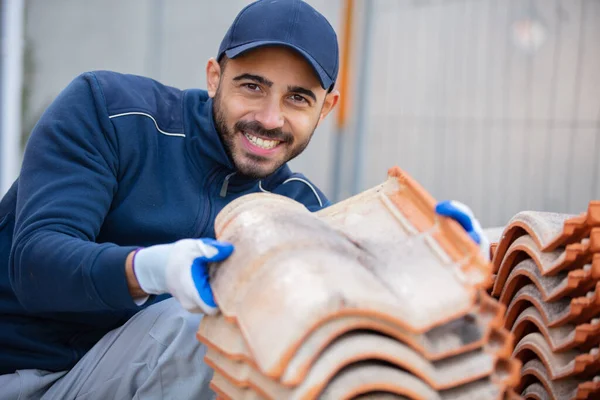 Builder Checking Pile Roof Tiles — Stock Photo, Image