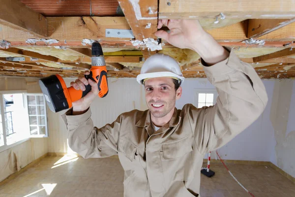 Man Drilling Ceiling — Stock Photo, Image