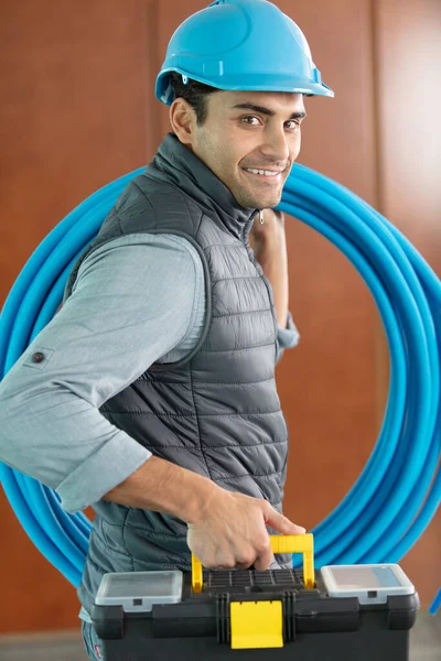 Portrait Handsome Plumber Carrying Hose — Stock Photo, Image