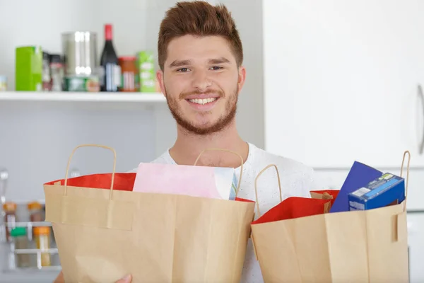 Man Holding Paper Bags Full Food — Stock Photo, Image