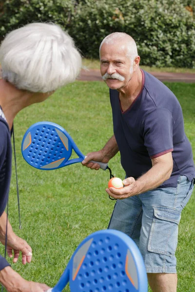 Couple Seniors Playing Tennis — Stock Photo, Image