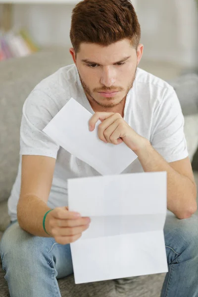 Young Man Reading Letter — Stock Photo, Image