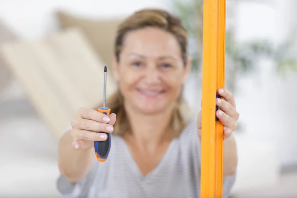 Woman Showing Screwdriver Screw — Stock Photo, Image