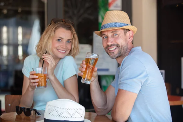 couple having a drink on pub terrace