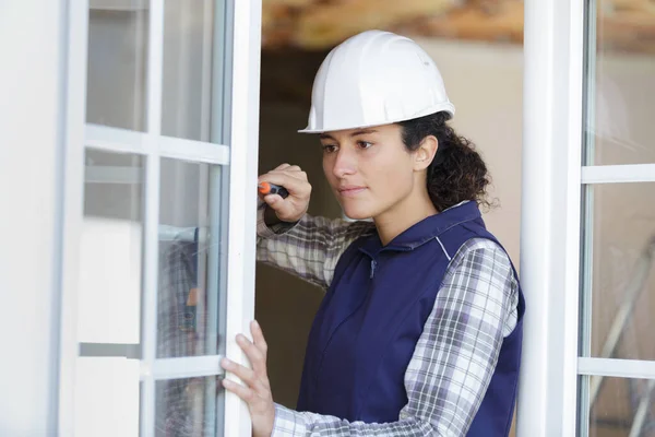 Woman Installing Window Handle Screwdriver Indoors — Stock Photo, Image