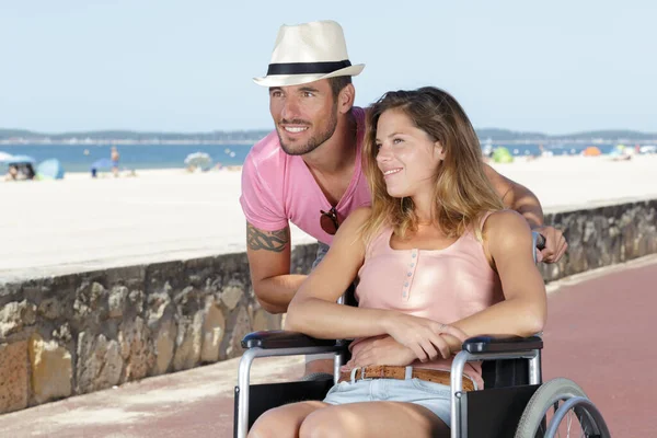 beautiful young woman in a wheelchair meeting on a date