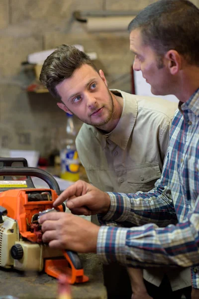 Two Men Work Operating Machine Cutting Plywood Panels — Stock Photo, Image