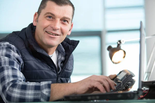 Portrait Mature Male Technician Holding Multimeter — Stock Photo, Image