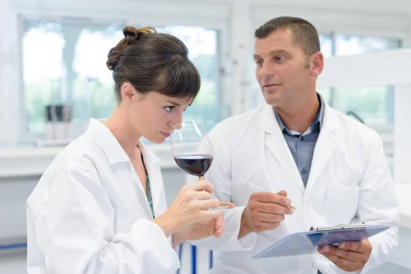 Oenologist Smelling Wine Colleague Holding Clipboard Note Findings — Stock Photo, Image