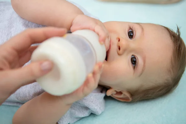Charming Baby Drinks Milk Bottle — Stock Photo, Image
