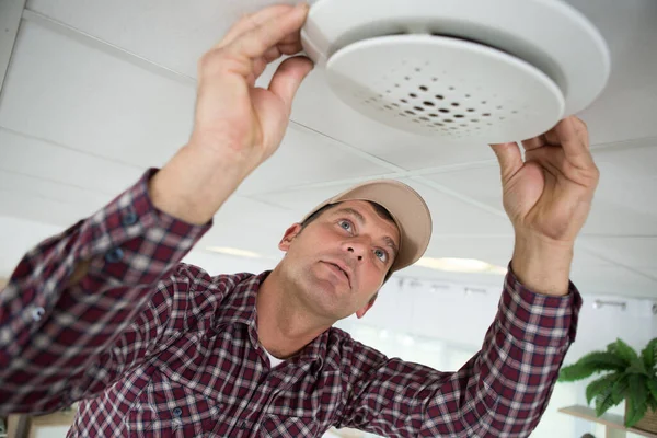 Repairman Repairing Ceiling Air Conditioning Unit — Stock Photo, Image