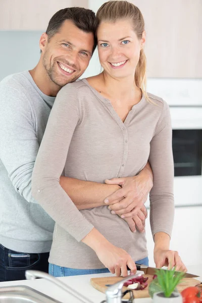 Young Married Couple Embraces Standing Table Kitchen — Foto de Stock