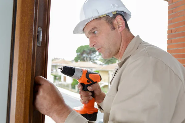 Mid Adult Man Drilling Hole Wall — Stock Photo, Image