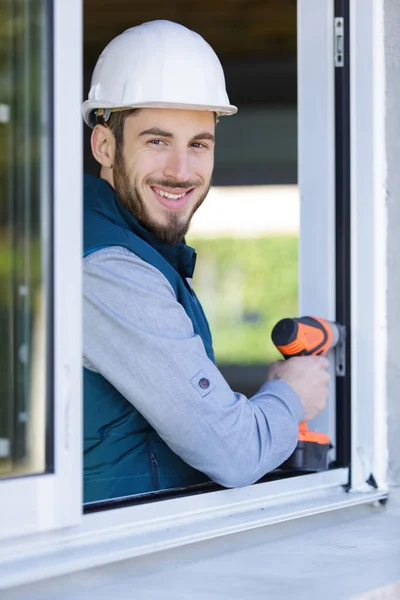 Worker Wearing Protective Helmet Drilling Holes Window — Fotografia de Stock