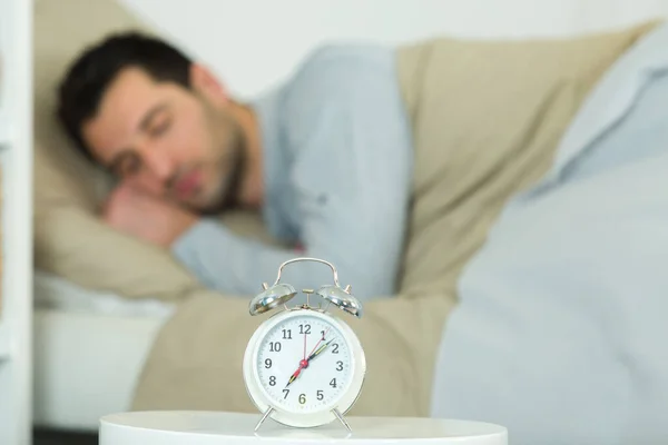 Alarm Clock Sleeping Man Bed — Stock Photo, Image
