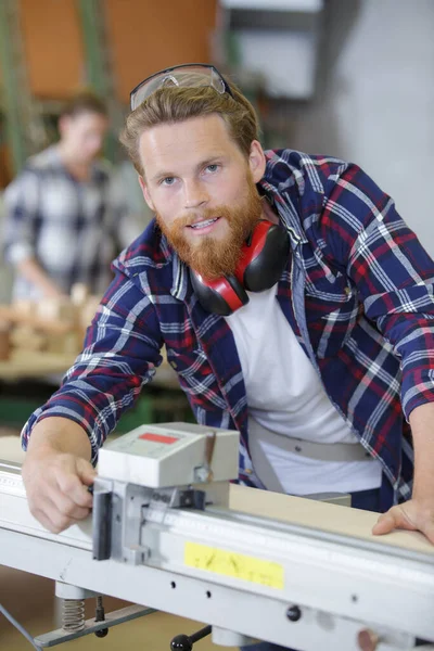 Bearded Handsome Cabinetmaker Tabletop — Stock Photo, Image