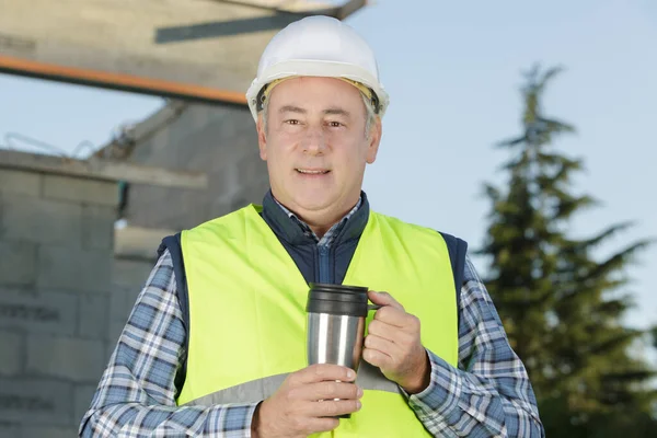 Male Builder Foreman Having Coffee Break — Stockfoto
