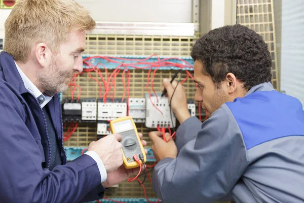 Electrician Measuring Voltage Distribution Board Closeup — Stock Photo, Image
