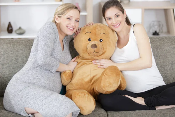 teddy bear and pregnant women