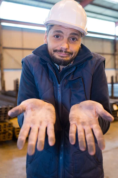 Worker Showing His Dirty Hands Royalty Free Φωτογραφίες Αρχείου