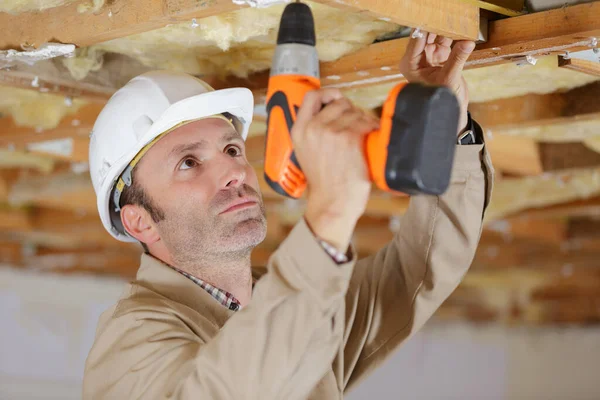 Close Manual Worker Drilling Ceiling — Stock fotografie