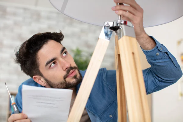 Man Home Appliances Choosing Modern Stylish Lamp — Stock Photo, Image