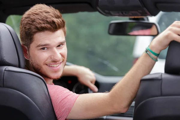 Young Man Looking Back Drivers Seat Car — Stock Photo, Image