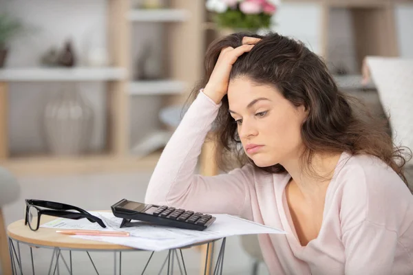 Uneasy Woman Doing Her Home Accounts — Stockfoto
