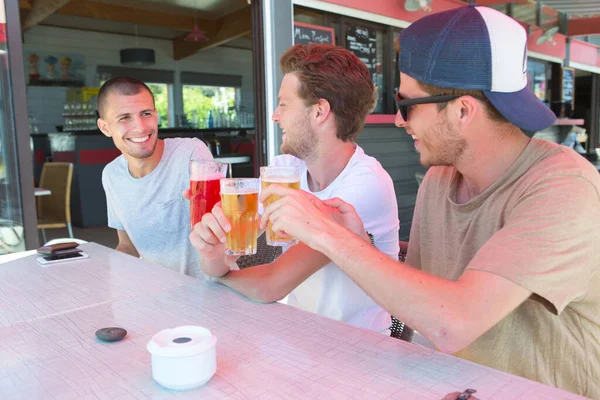 Group Young Men Having Drinks Flying Colours — Stock Photo, Image