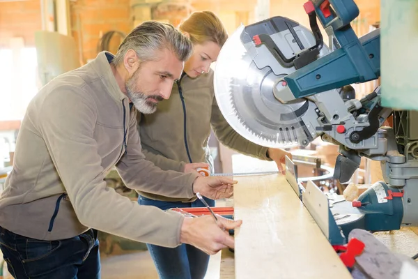 Two Carpenters Cutting Wooden Plank Circular Saw — Stock Photo, Image