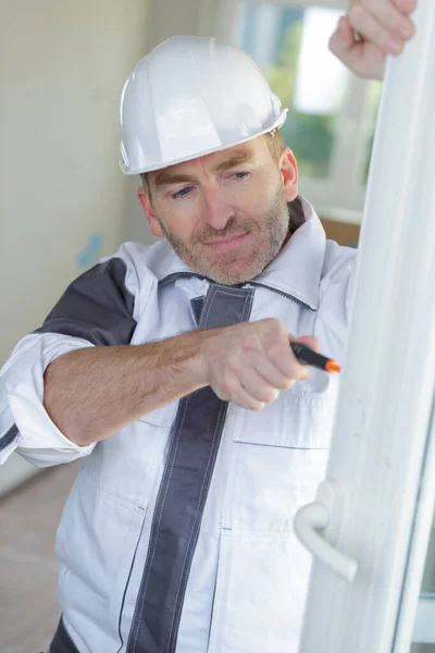 Contractor Using Screwdriver Pvc Frame — Stock Photo, Image