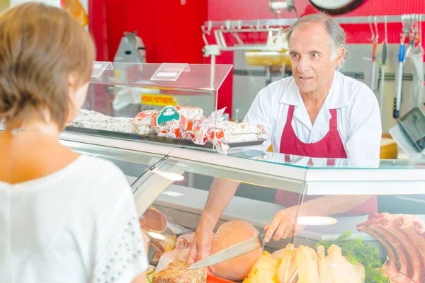 Butcher Serving Customer Deli Counter — Stock Photo, Image