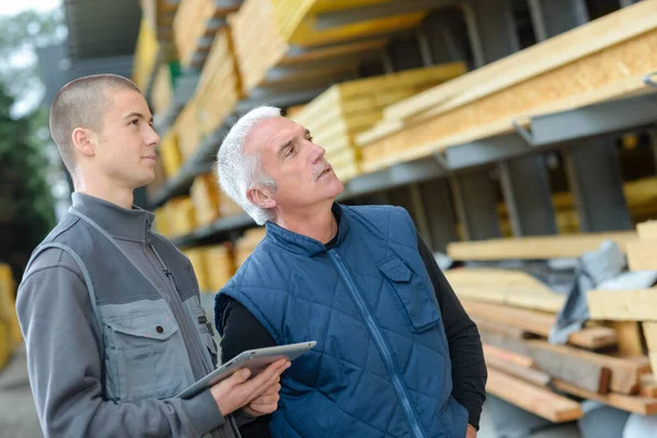 Men Looking Wood Materials Outlet — Stock Photo, Image