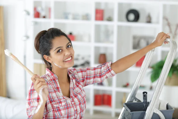 Young Happy Woman Painting Interior Wall — Stock Photo, Image
