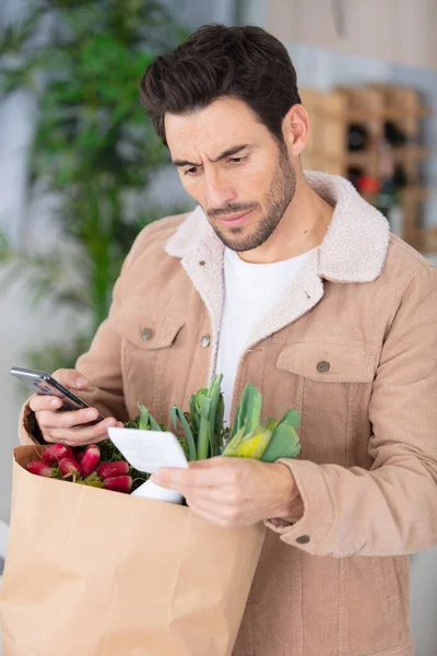 Man Holding Paper Bag Full Healthy Food — Stock Photo, Image