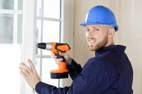 Builder Holding Rotary Drill — Stock Photo, Image