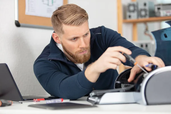 Young Man Checking Pinter Office — Stock Photo, Image