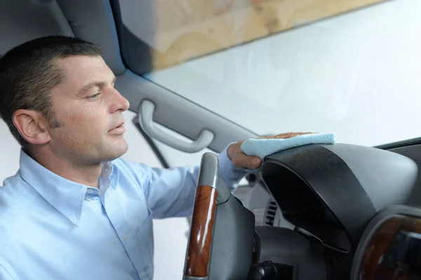 Man Cleaning Car Dashboard — Stock Photo, Image