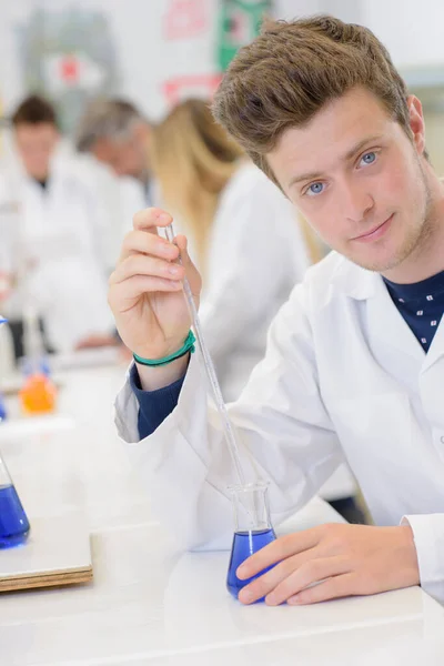 Male Science Student Holding Pipette Glass Flask — Stock Photo, Image
